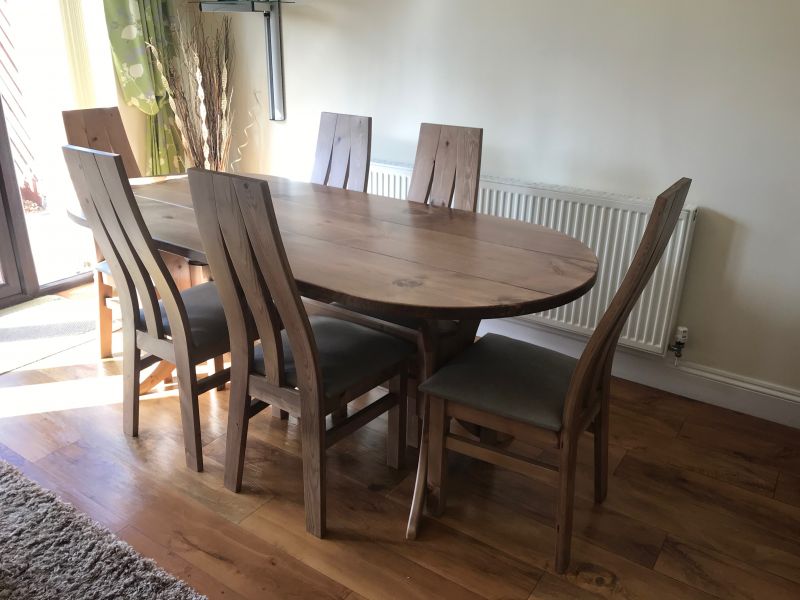 A Brand New Design of Dining Table and Chairs handcrafted from solid Pine with an elegant Oak stain and lacquered finish. : Swipe To View More Images